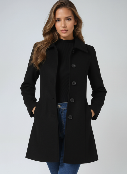 Black structured-collar coat shown with its long sleeves slightly gathered and hands placed in the side pockets.