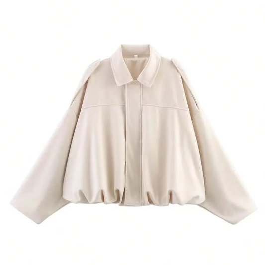 Front view of a woman wearing a relaxed bomber jacket with a pointed collar, balloon sleeves, and a gathered hem._6