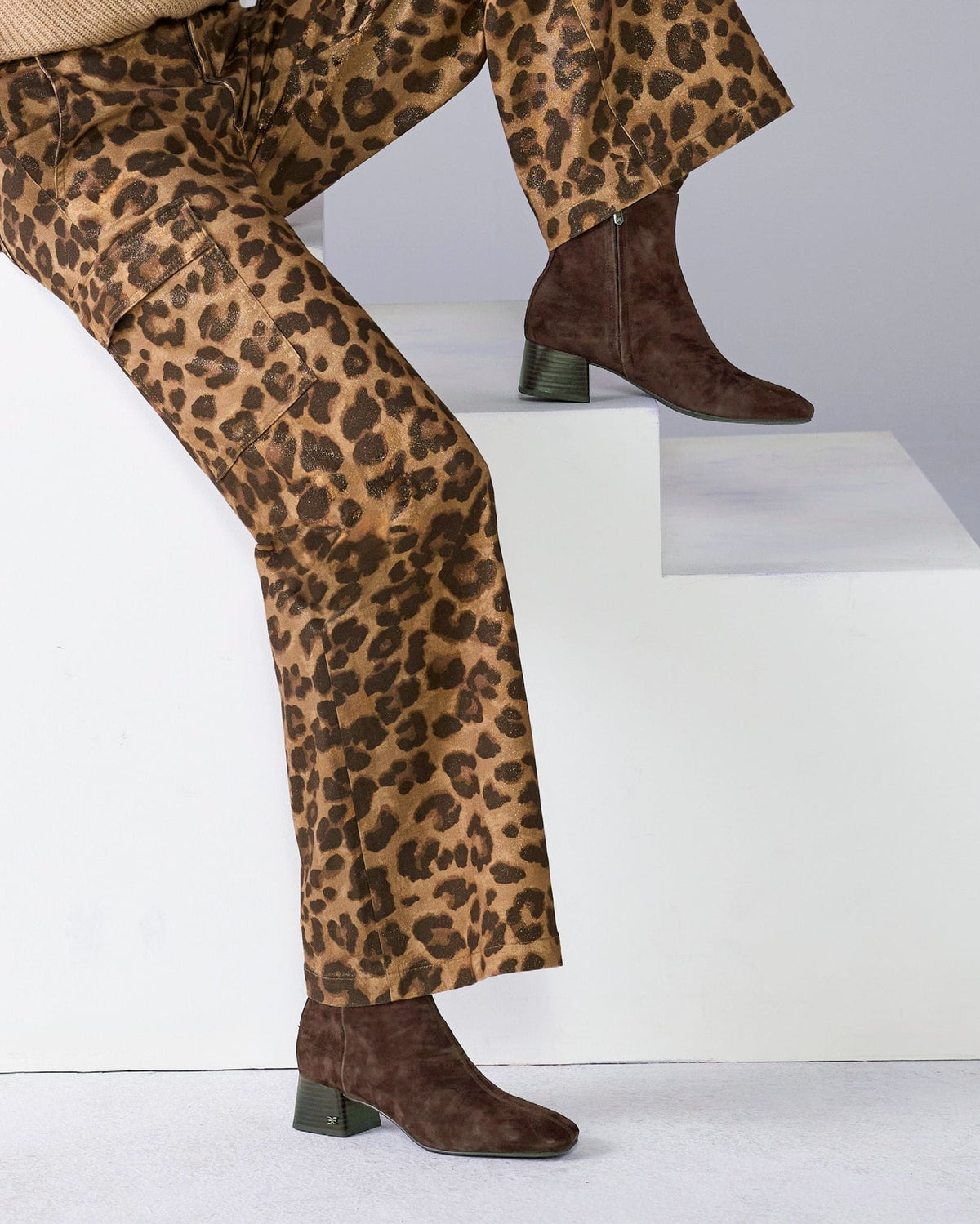 Brown ankle bootie with block heel and soft square toe shown from side angle_1