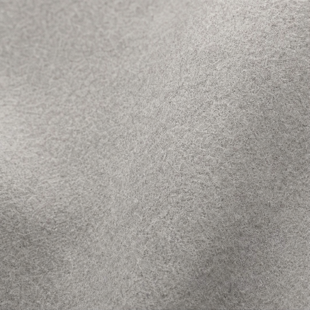 Close-up of the jacket's light gray textured surface.