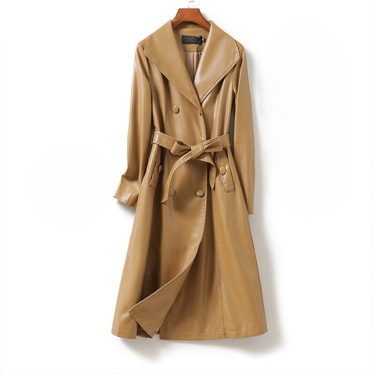 A long double-breasted trench coat with wide lapels and a tied waist belt displayed on a hanger._0
