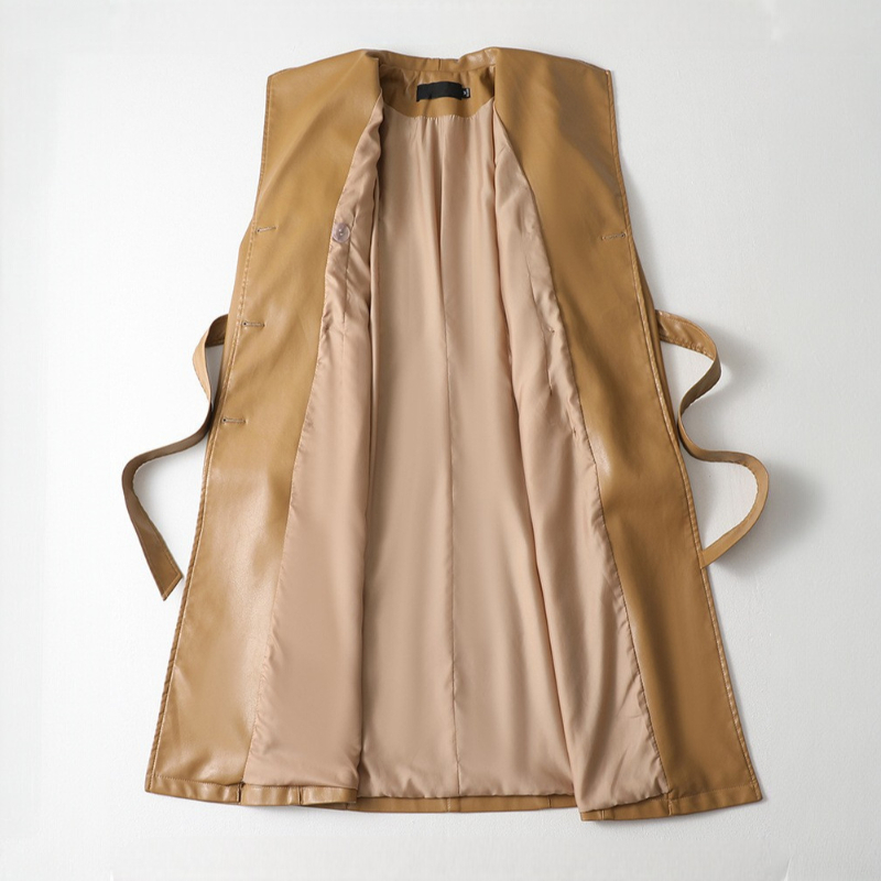 A long double-breasted trench coat with wide lapels and a tied waist belt displayed on a hanger._2