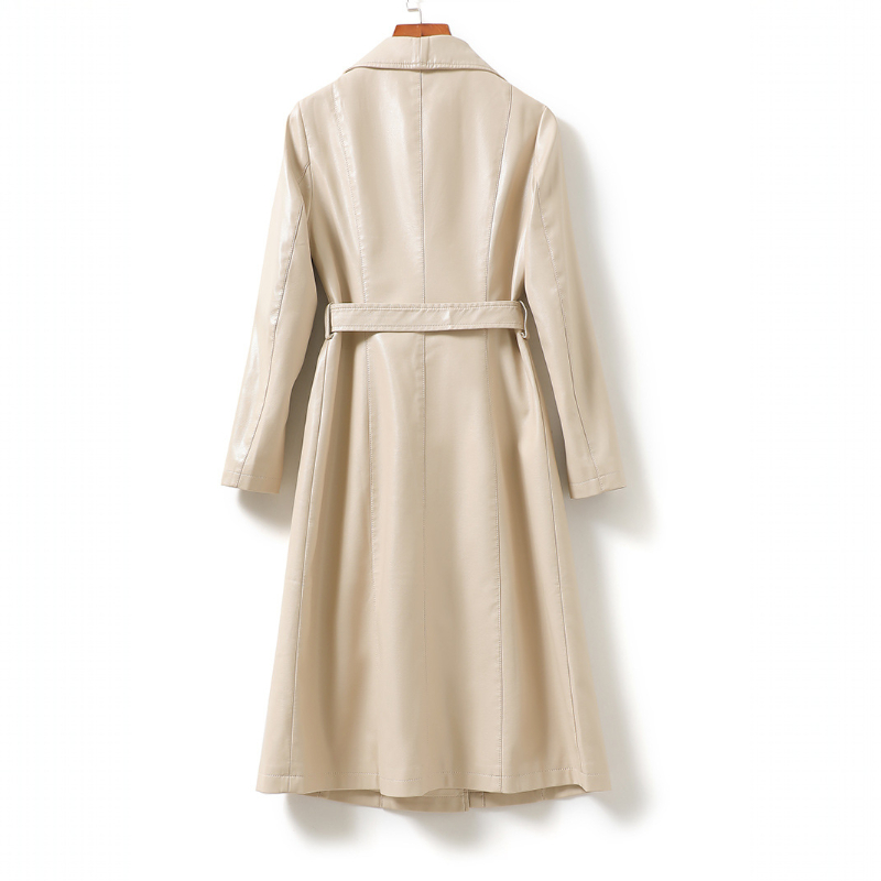 A long double-breasted trench coat with wide lapels and a tied waist belt displayed on a hanger._4