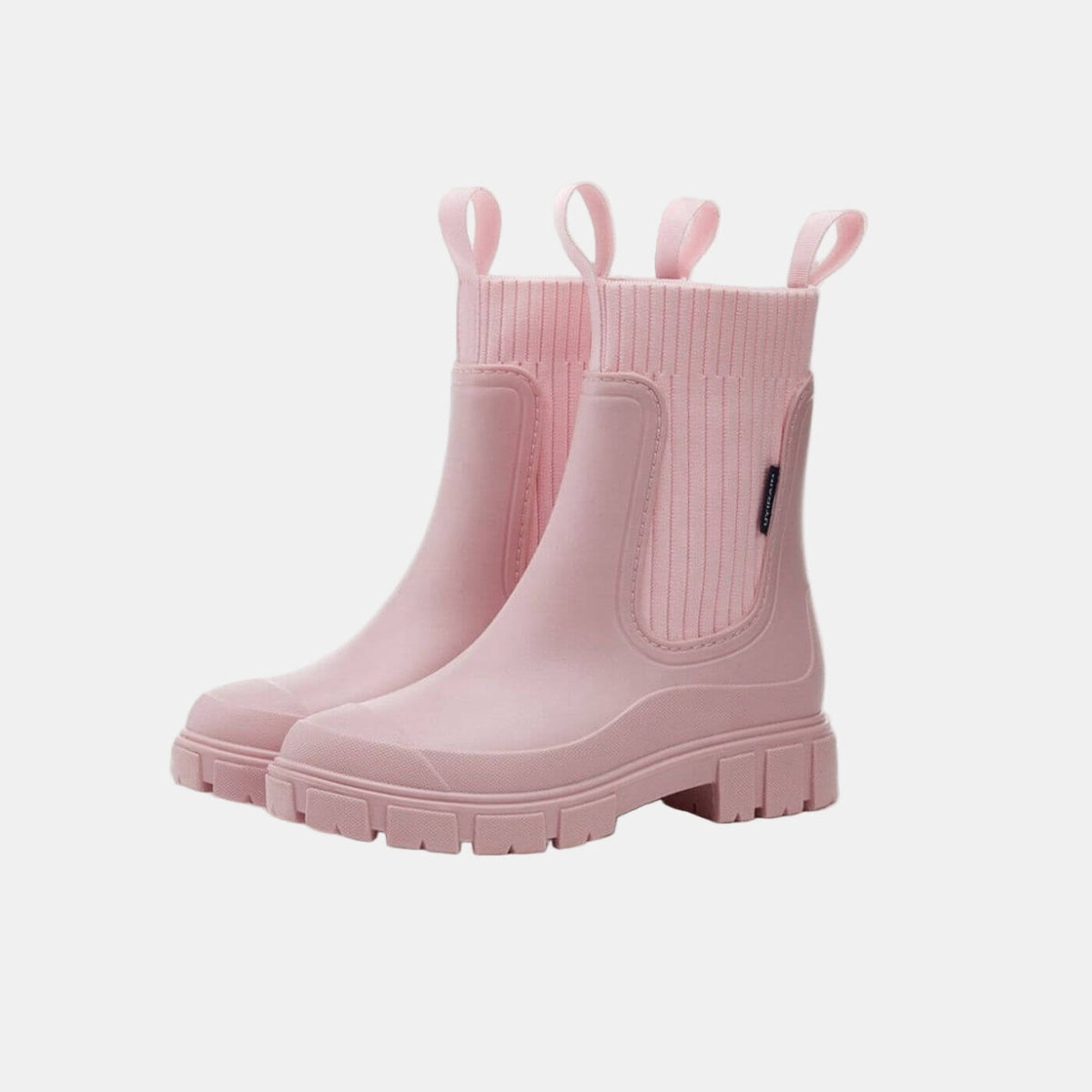 Pair of pink Chelsea boots with ribbed elastic side panels, pull tabs, and chunky lugged soles.