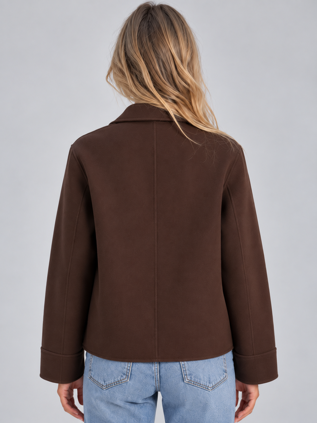 Back view of the brown overshirt jacket showing its clean straight silhouette, wide collar, and long sleeves.
