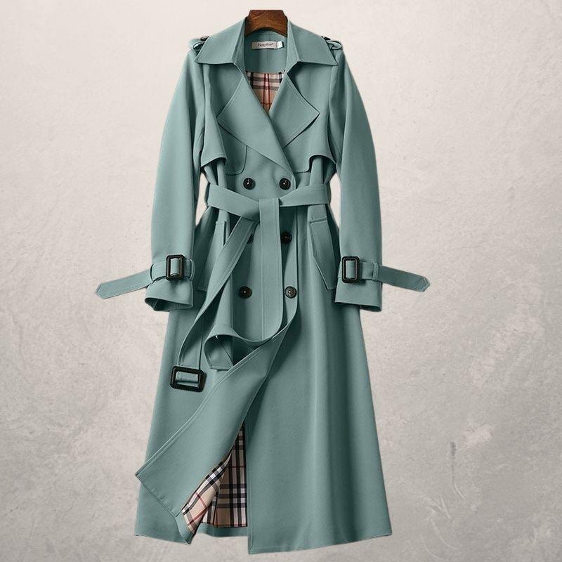 Sage green trench coat shown open at the front, revealing a checked lining beneath its belted double-breasted design.