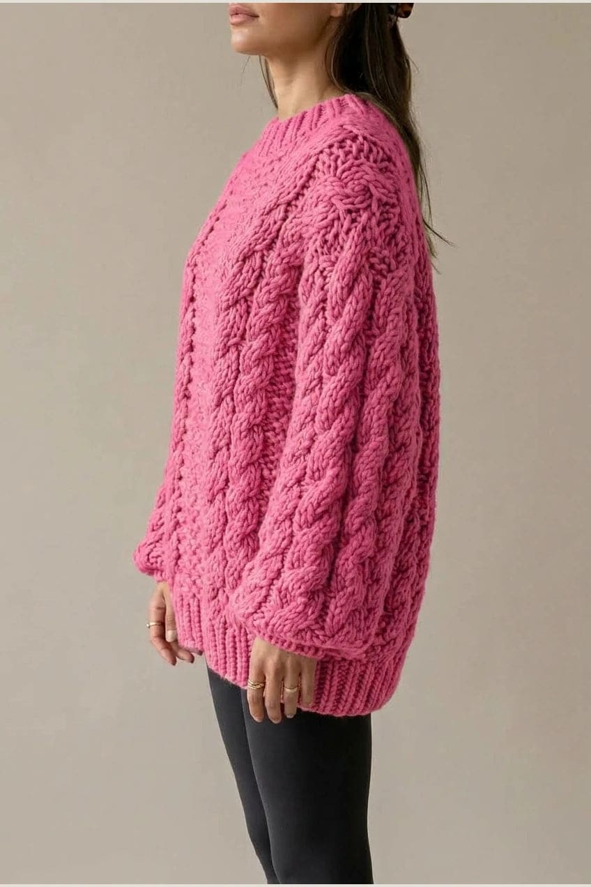 Model wearing an oversized chunky cable knit mock neck sweater dress with wide turn back cuffs and a ribbed hem, styled with sheer tights._5