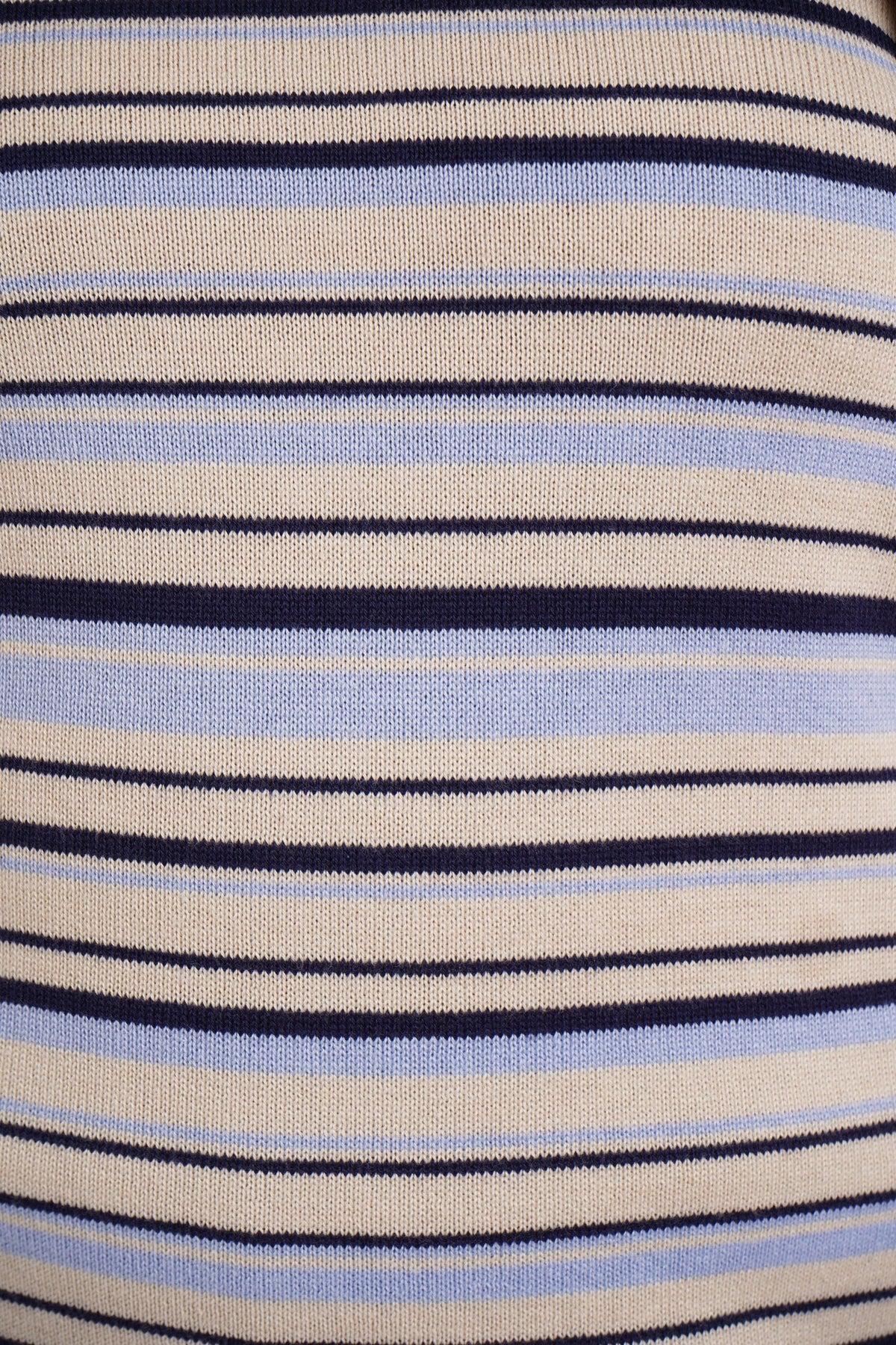 Woman wearing a short sleeve striped knit polo top with a flat collar and three button placket._5