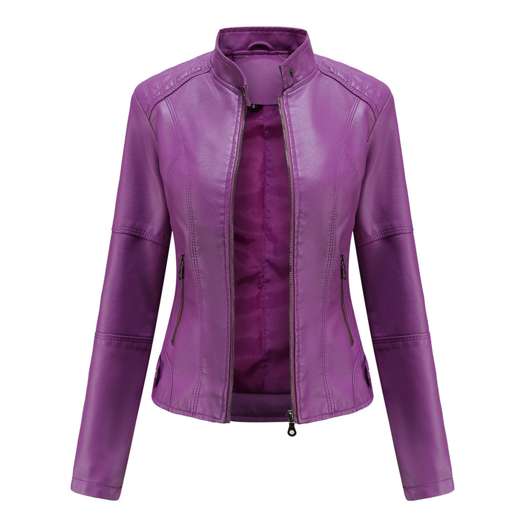 Purple fitted moto jacket with a stand collar, front zip closure, curved panel detailing, and matching zipped side pockets.