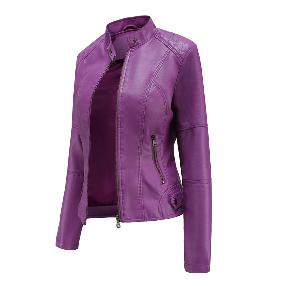 Purple moto jacket shown from an angled view with its open front, snap-tab collar, fitted waist, and side zipper pocket.