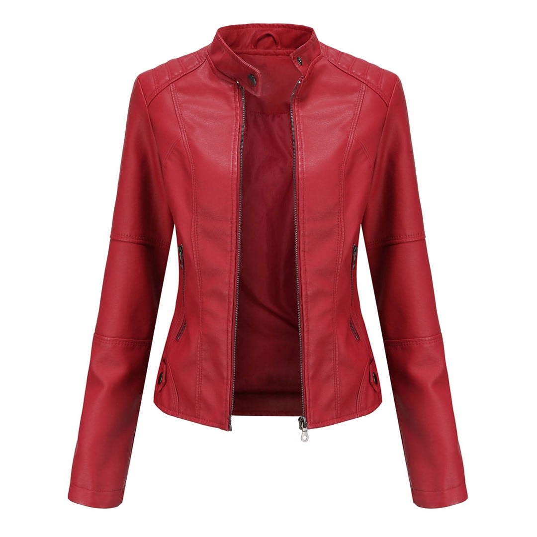 Red fitted zip-up moto jacket with a stand collar, paneled front, long sleeves, and zipped side pockets.