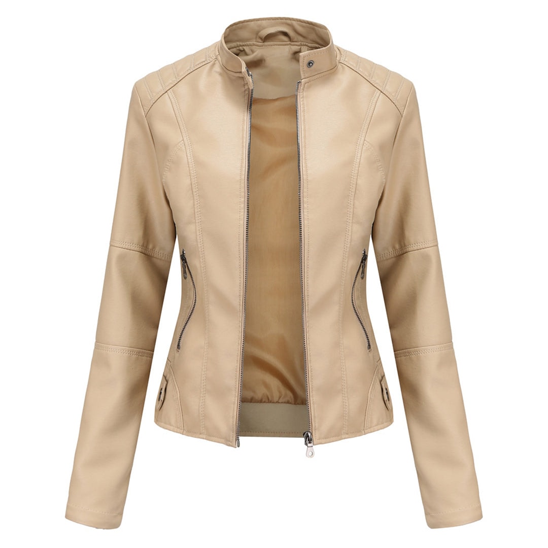 Beige fitted moto jacket shown frontally with a raised snap-detail collar, central zipper, and curved side pockets.