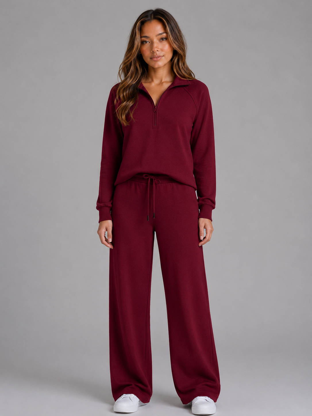 Front view of the matching lounge set in burgundy, featuring long sleeves and relaxed wide-leg trousers.