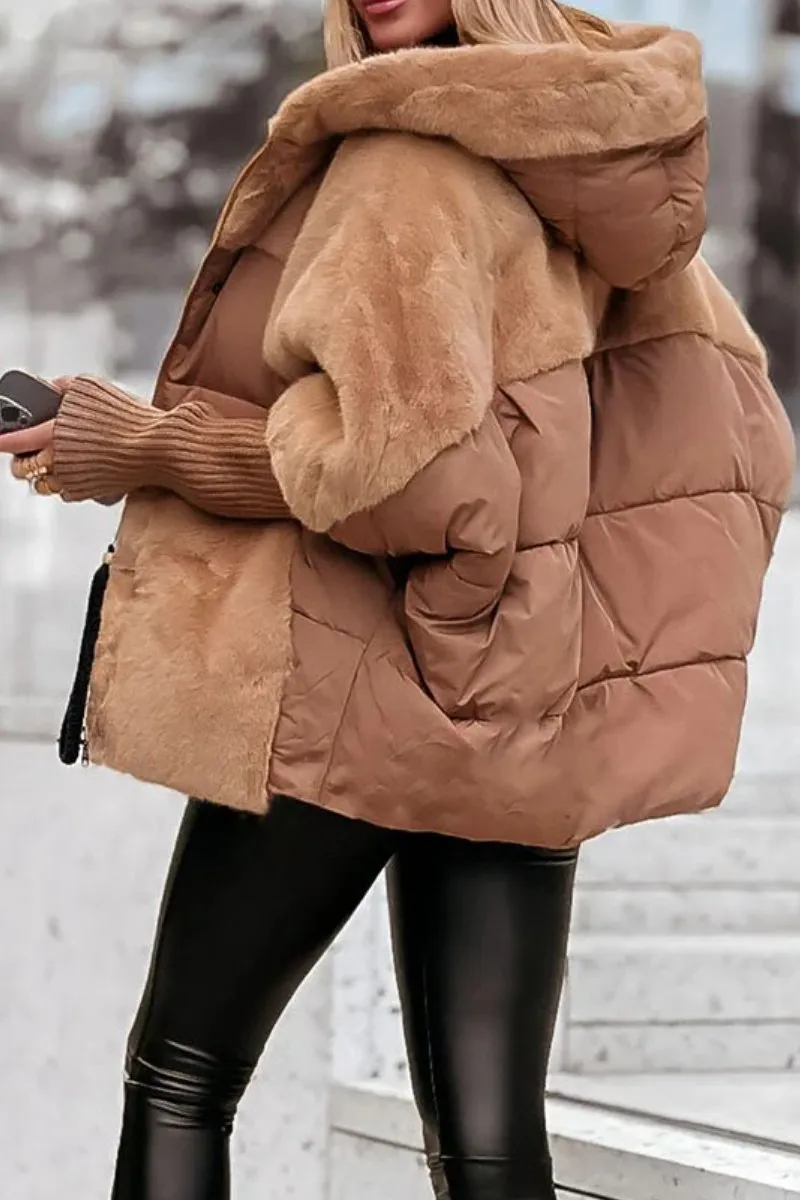Back view of a camel hooded puffer jacket showing its quilted body, oversized hood, and plush fur paneling.