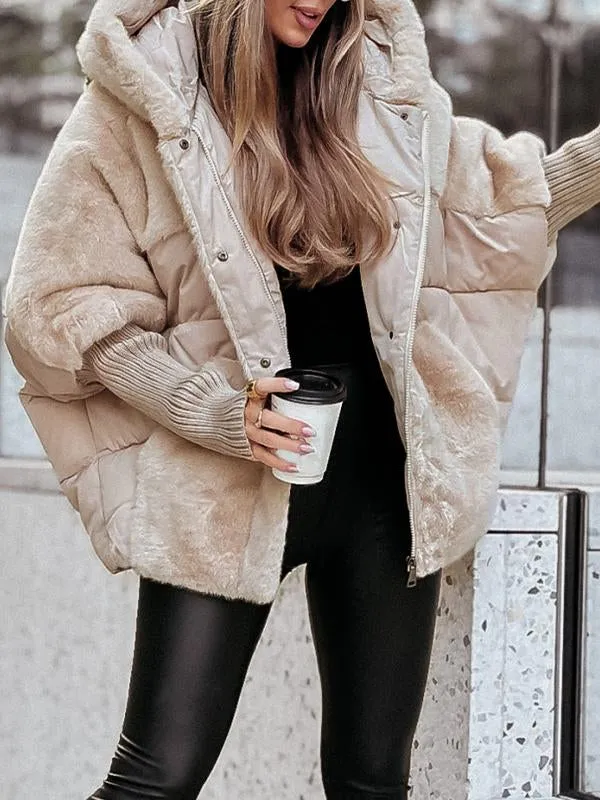 Cream mixed-texture jacket shown from the front with its zipper open, plush panels visible along the lower body, and ribbed cuffs.