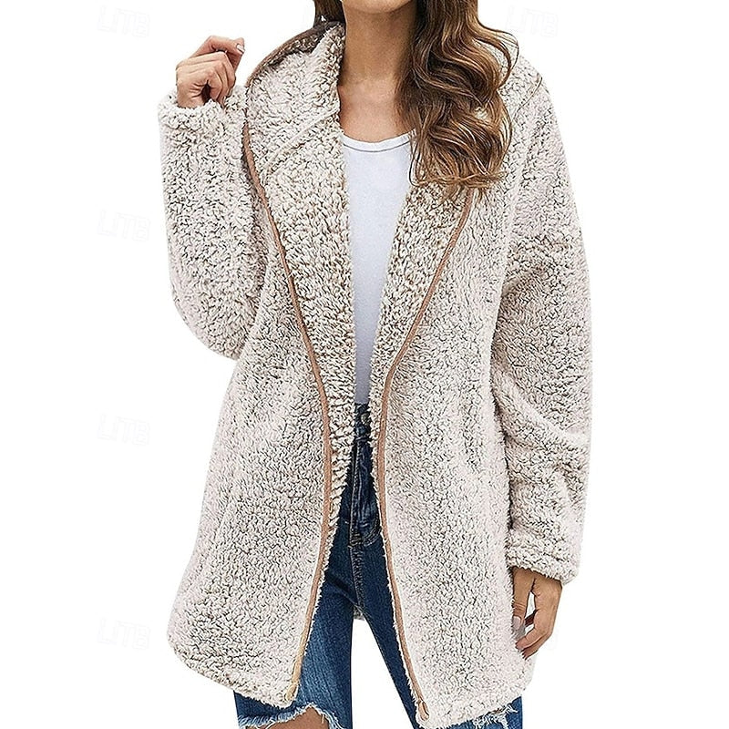 Cream teddy-textured jacket with a longer relaxed fit, attached hood, and brown-trimmed open front.