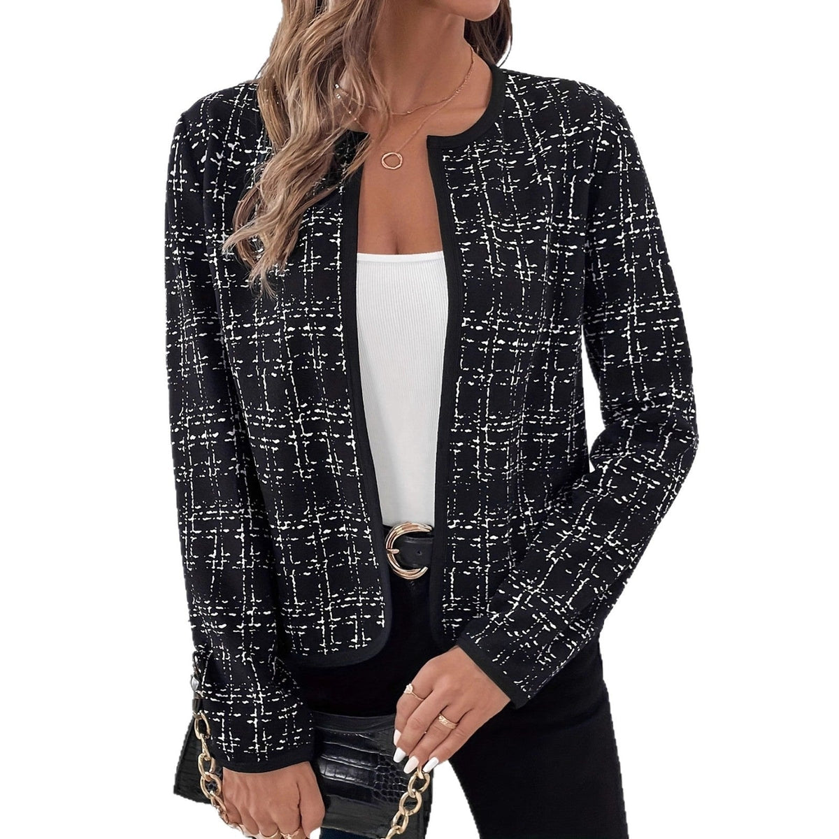 Black contrast-check jacket shown from the front with its open design, rounded lower edges, and long sleeves.