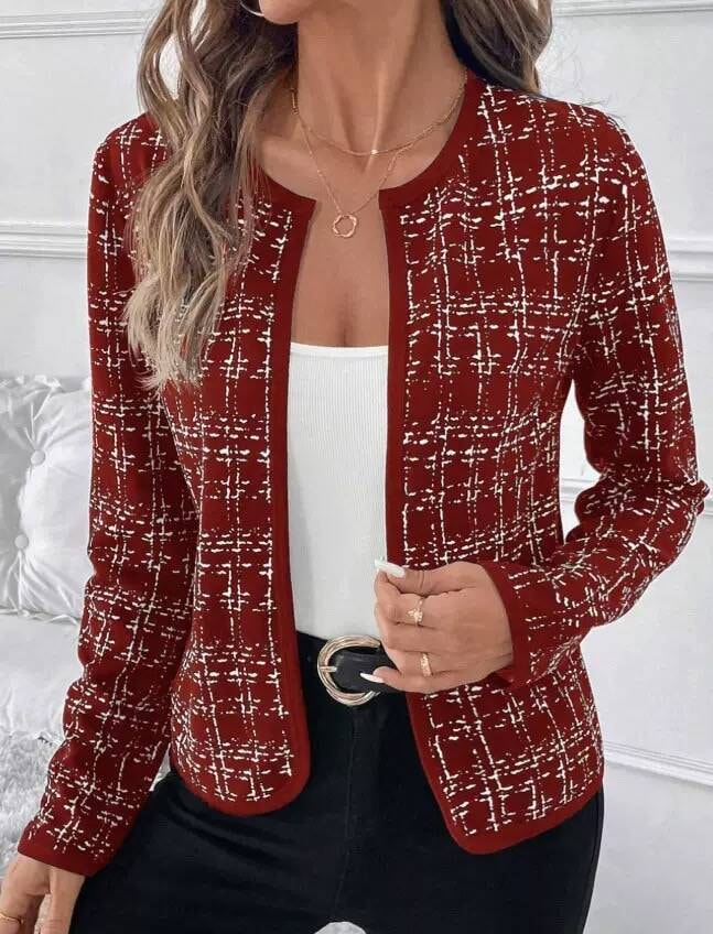 Red jacket with a white contrast check pattern, open front, rounded collarless neckline, and long sleeves.