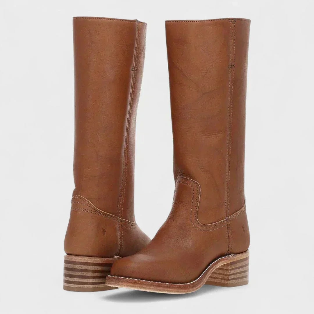 Medium brown knee-high boots featuring smooth shafts, curved ankle panels, rounded toes, and striped stacked block heels.