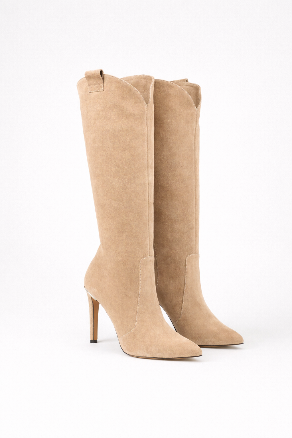 Pair of tan knee-high boots with pointed toes and slender stiletto heels shown together on a white background.