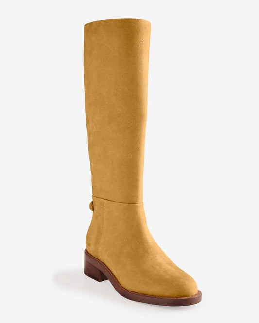 A knee-high riding boot with a low stacked heel and subtle back strap detail, shown in a warm neutral tone._0
