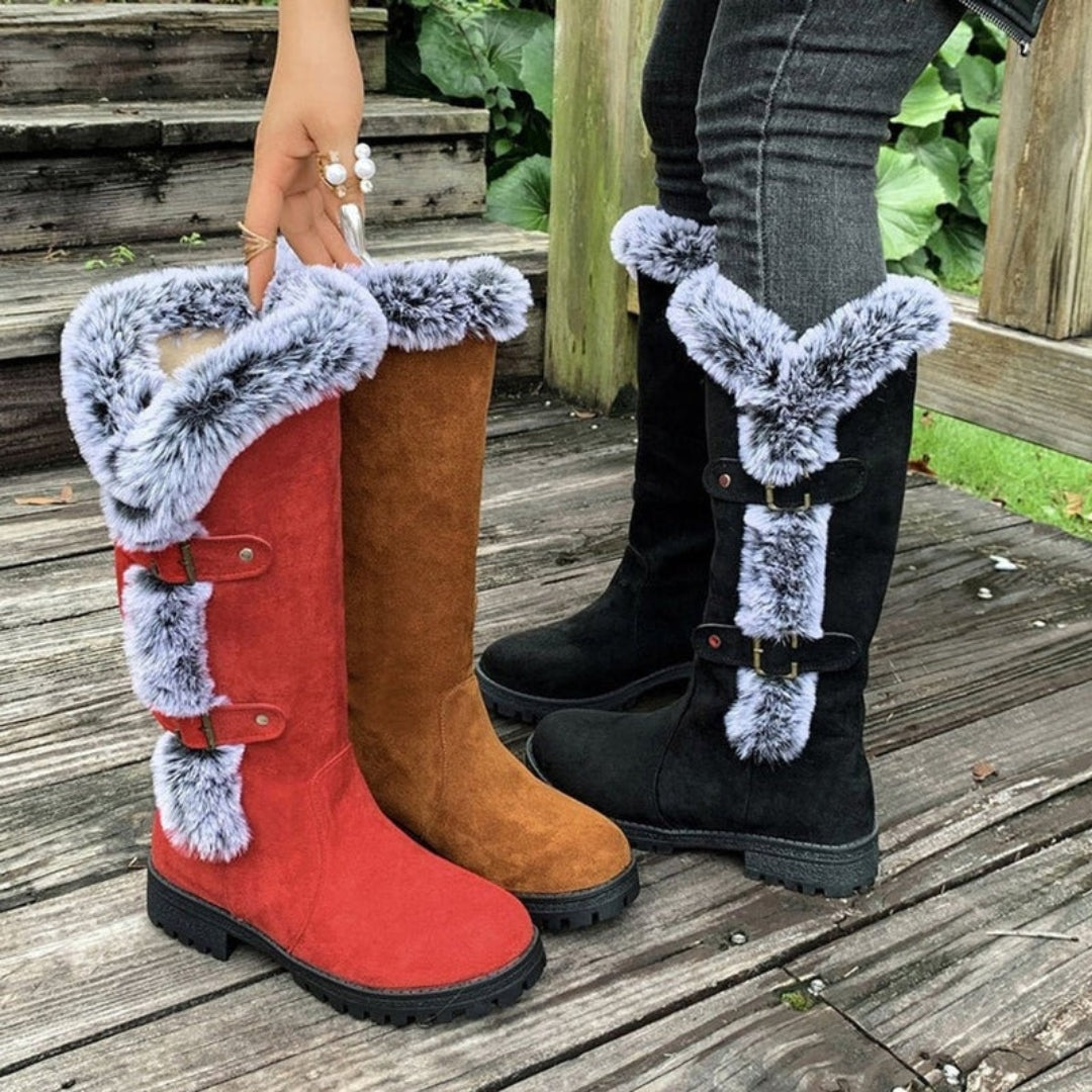 Three color options of the knee-high winter boots—red, tan, and black—shown together with faux fur cuffs and lug soles.