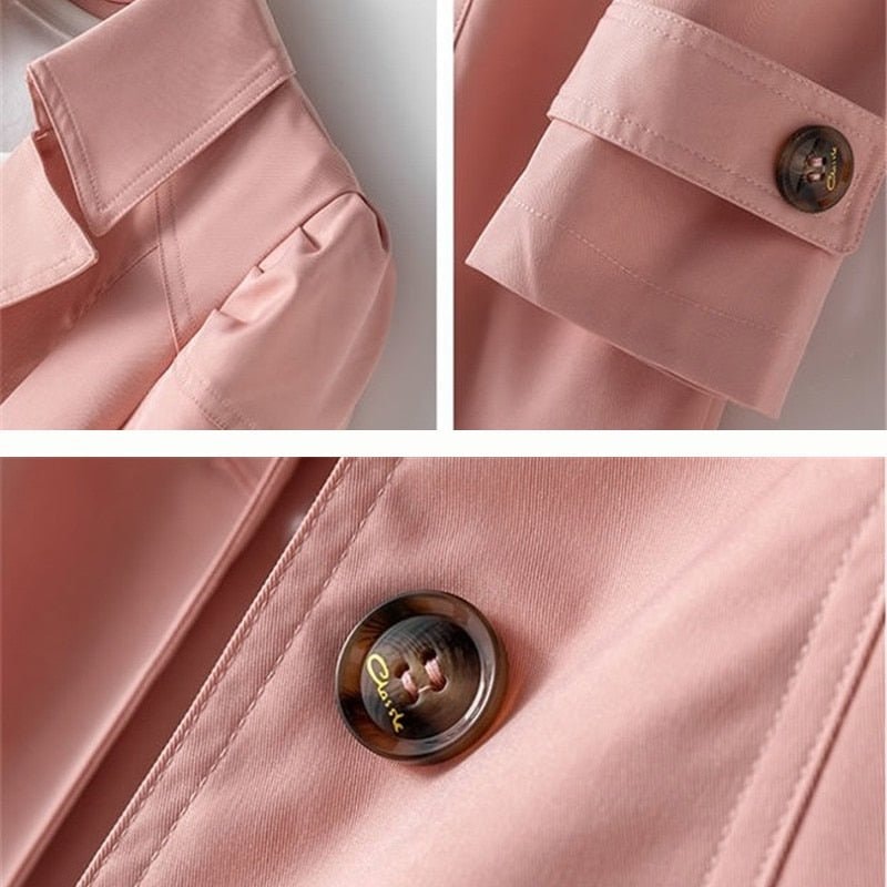 Close-up detail of the pink trench coat showing stitched cuff tabs and a glossy brown button.