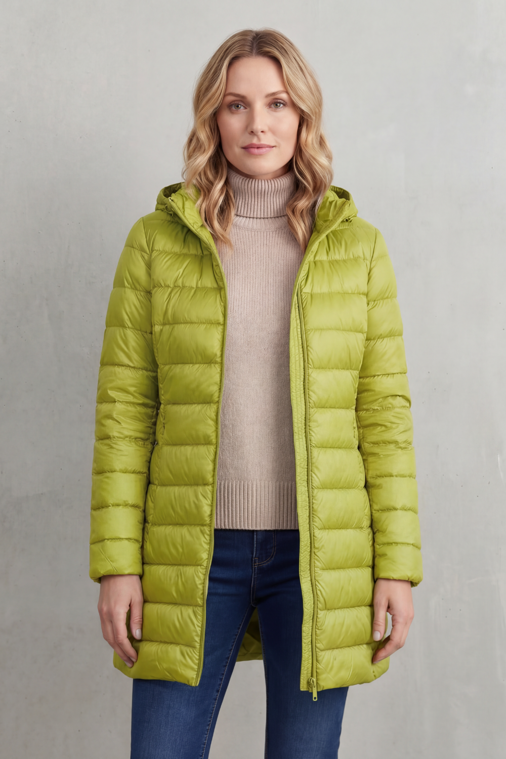 Front view of the lime green hooded puffer jacket with an open zipper, long hem, and hooded design.