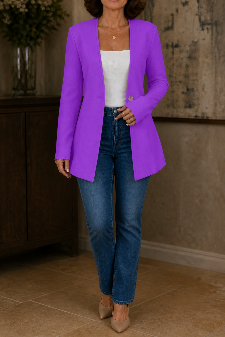 Purple longline blazer styled with a white top and jeans in a full-length view.
