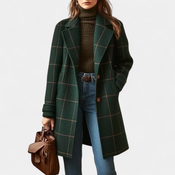 Dark green plaid mid-thigh coat styled with a brown turtleneck, jeans, and a handbag, showing its open front and side pocket.