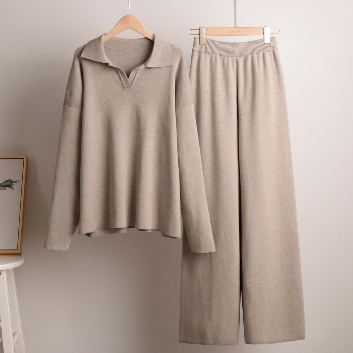Taupe polo sweater and wide-leg pants hanging separately to show the coordinated set.