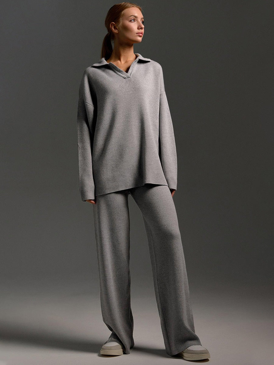 Model wearing the gray set from the front, showing the collared sweater and flowing wide-leg pants.