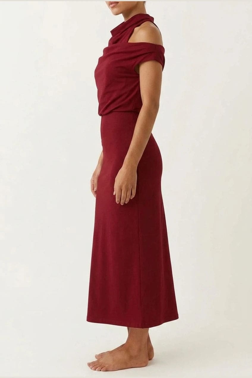Sleeveless midi dress with a high draped neckline, blouson bodice and a bias cut skirt falling to the ankle._23