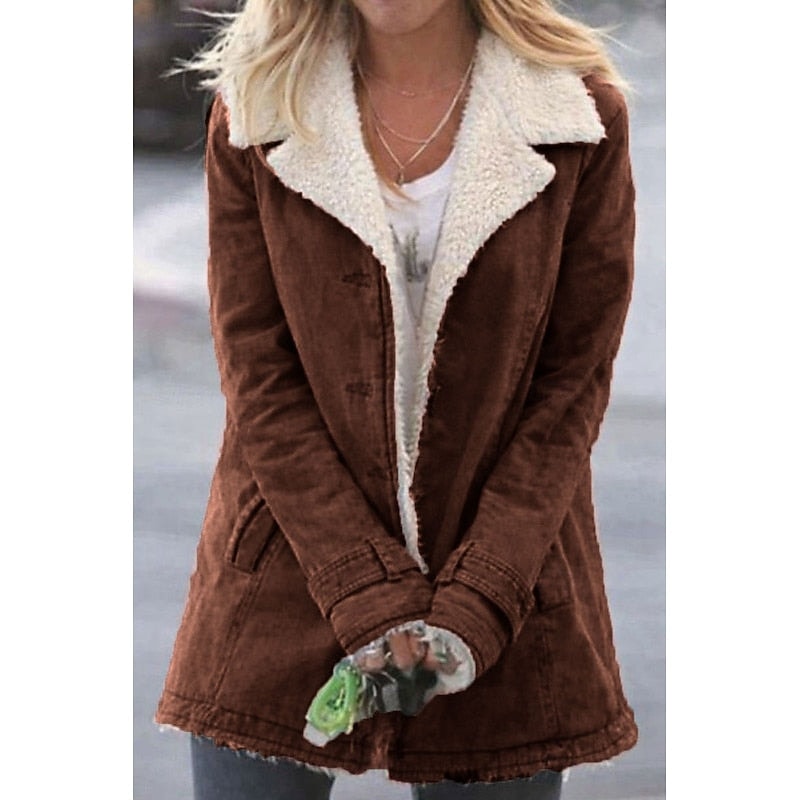 Brown mid-length coat with a cream sherpa lining visible at the wide notched collar and front opening.
