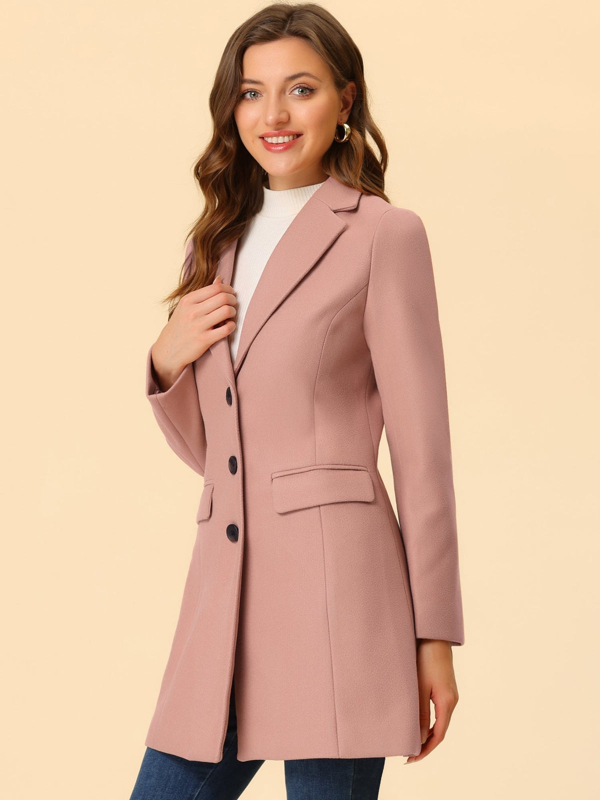 Dusty pink lapel coat shown from a side angle, highlighting the fitted waist and horizontal flap pocket.