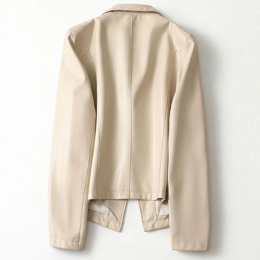 A tailored blazer with notched lapels, long sleeves, a single button closure, and front welt pockets shown on a hanger._5