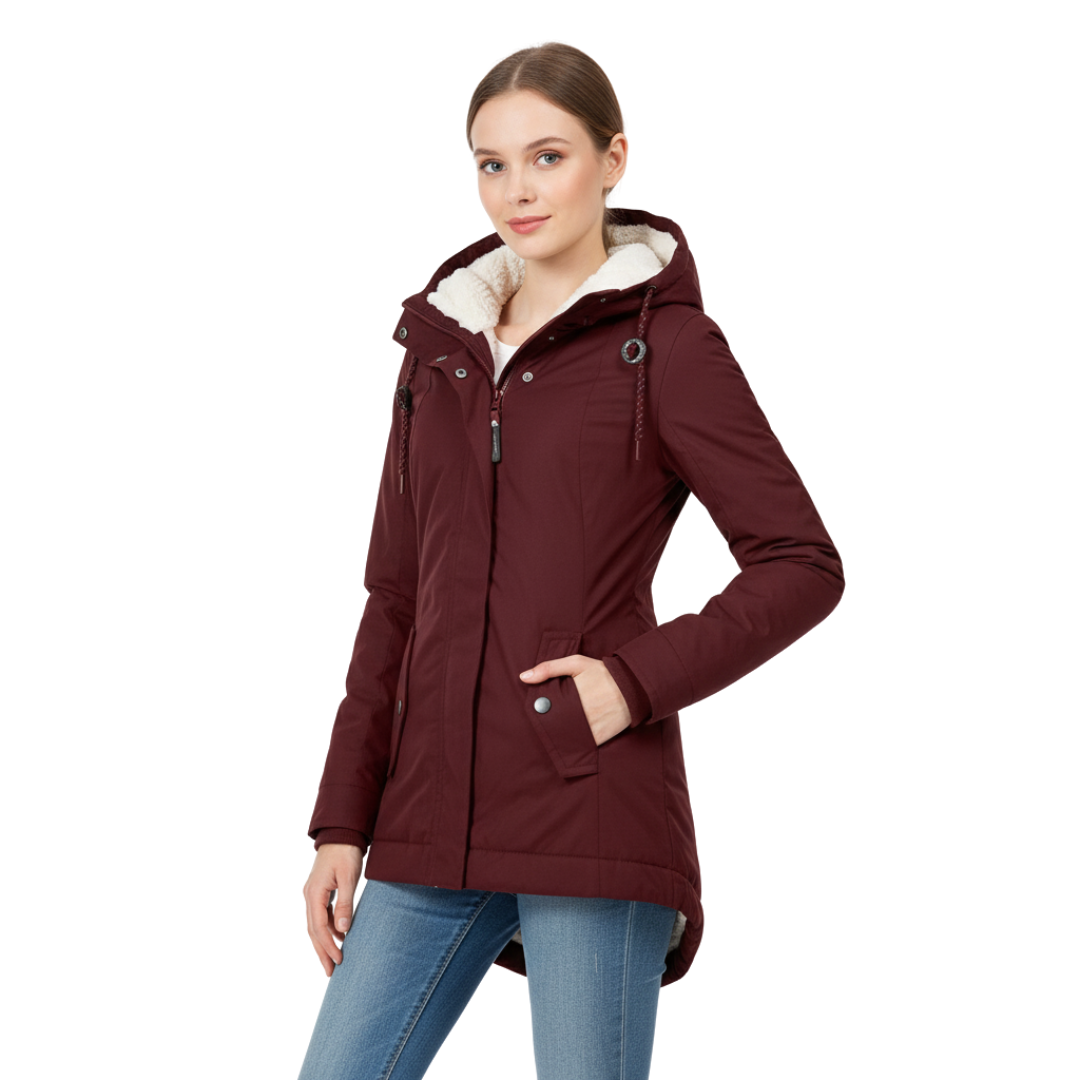 A model wears a hooded longline winter jacket with a front zip closure and front pockets._0