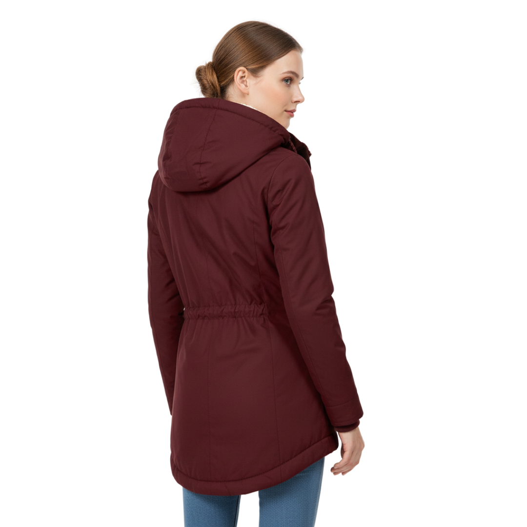 A model wears a hooded longline winter jacket with a front zip closure and front pockets._1