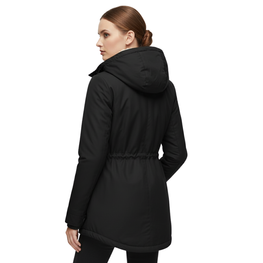 A model wears a hooded longline winter jacket with a front zip closure and front pockets._10