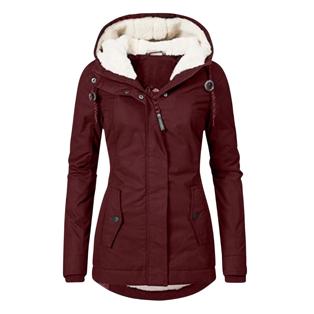 A model wears a hooded longline winter jacket with a front zip closure and front pockets._2