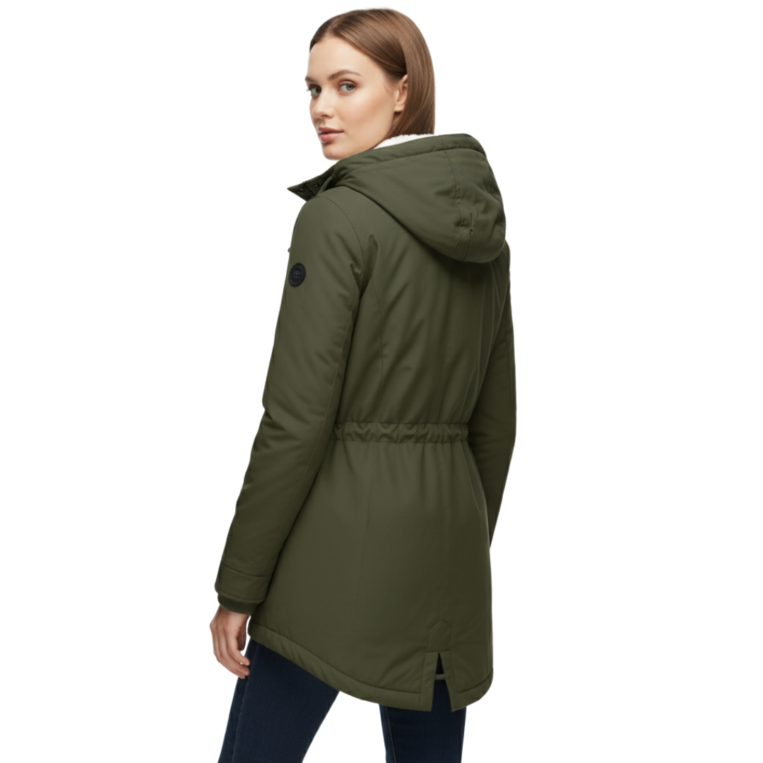 A model wears a hooded longline winter jacket with a front zip closure and front pockets._7