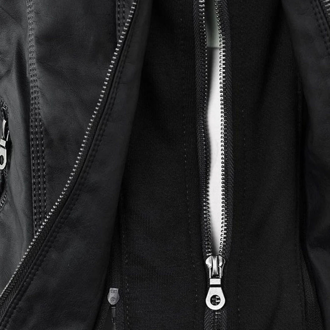 Model wearing a fitted biker-style jacket with a removable hood, front zipper, and zippered pockets._6