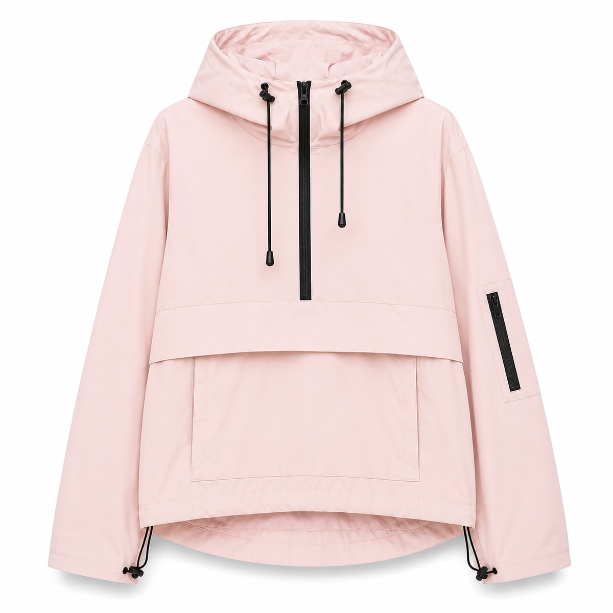 A model wears a hooded half zip anorak jacket with a large front pocket in a mountain setting._13