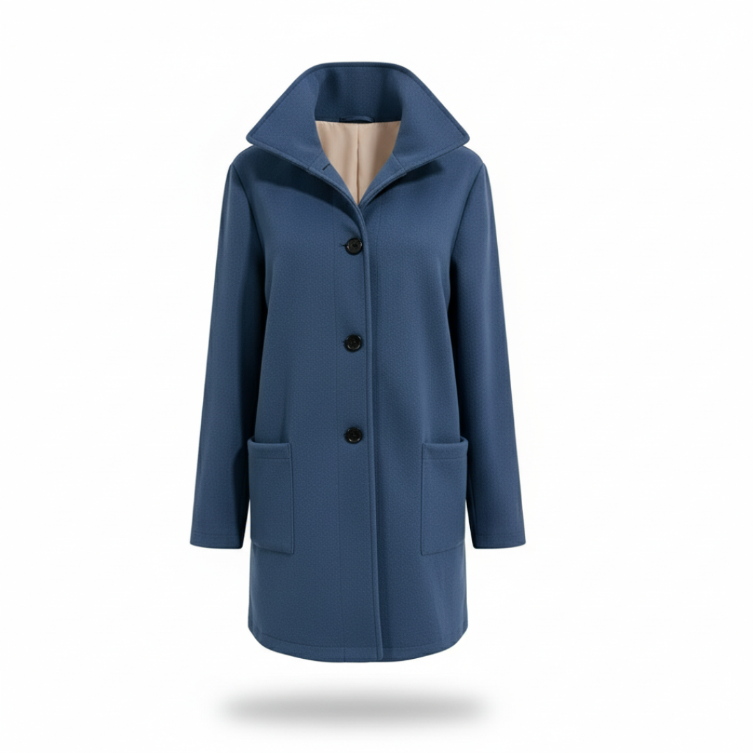 Model wearing a tailored knee length coat with a stand collar, front buttons, and patch pockets._10