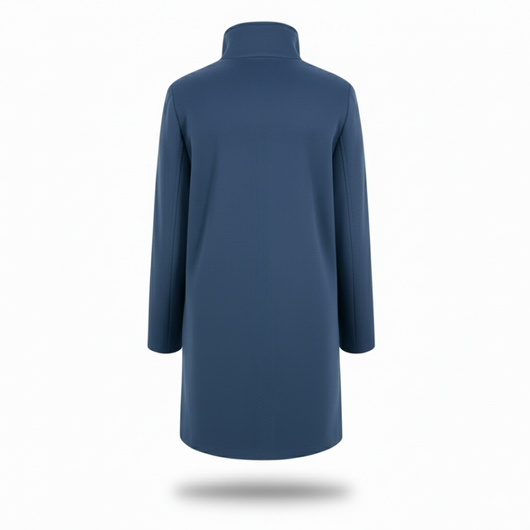 Model wearing a tailored knee length coat with a stand collar, front buttons, and patch pockets._11