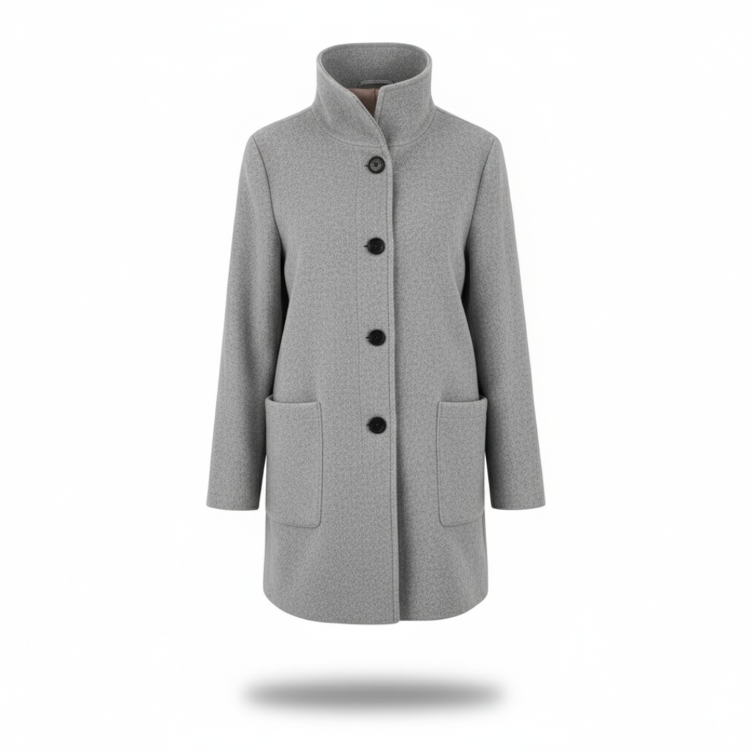 Model wearing a tailored knee length coat with a stand collar, front buttons, and patch pockets._2